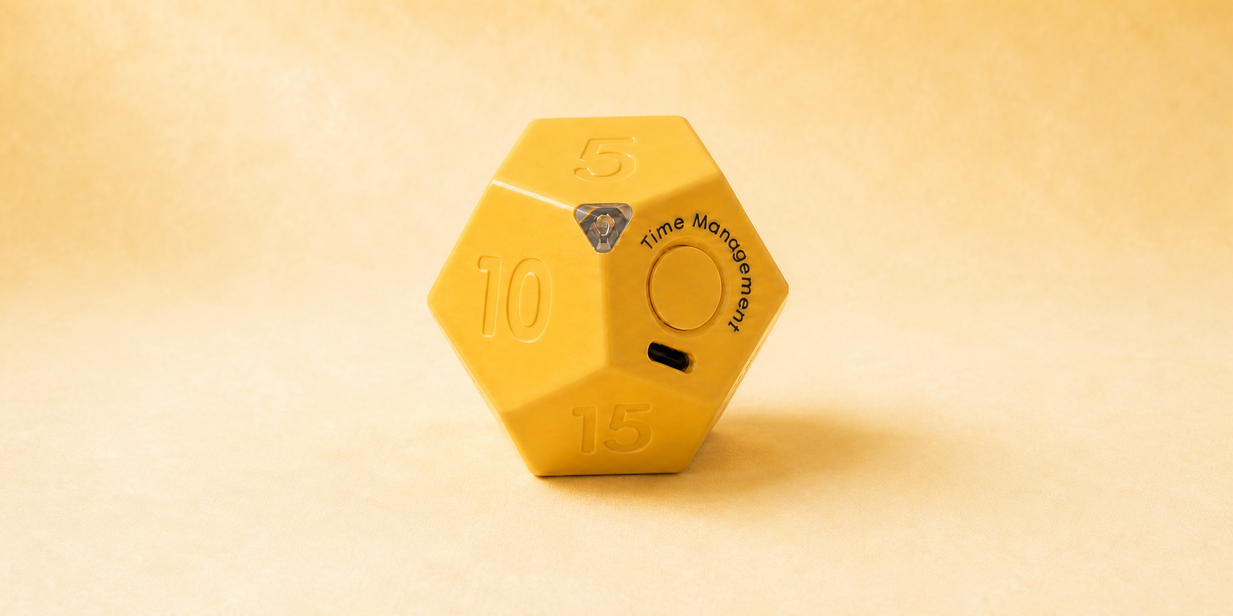 Yellow Tiltick FlipTimer on a warm neutral background
